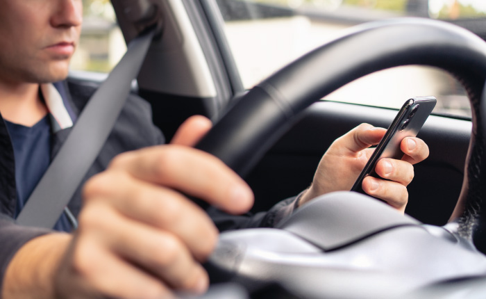 Be careful behind the wheel! Cell phone use increases accidents and insurance costs